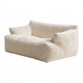 Canapé contemporain aux lignes épurées, coloris blanc cassé et beige clair