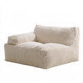 Canapé contemporain aux lignes épurées, coloris blanc cassé et beige clair
